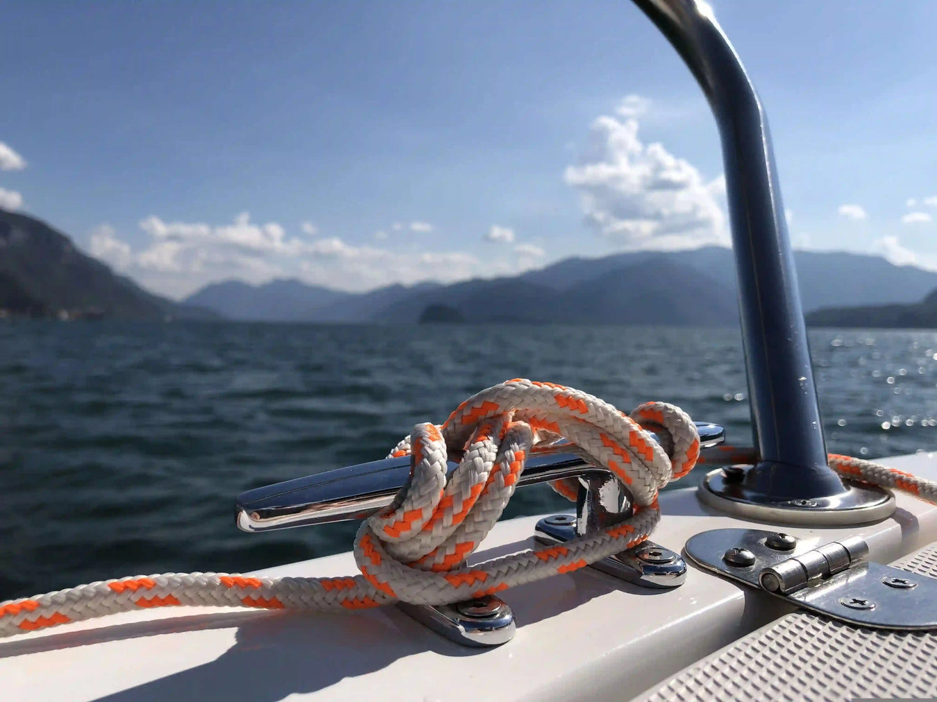 Boat cleat Close-up of a rope tied to a boat