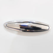 Silver metallic object on a white background