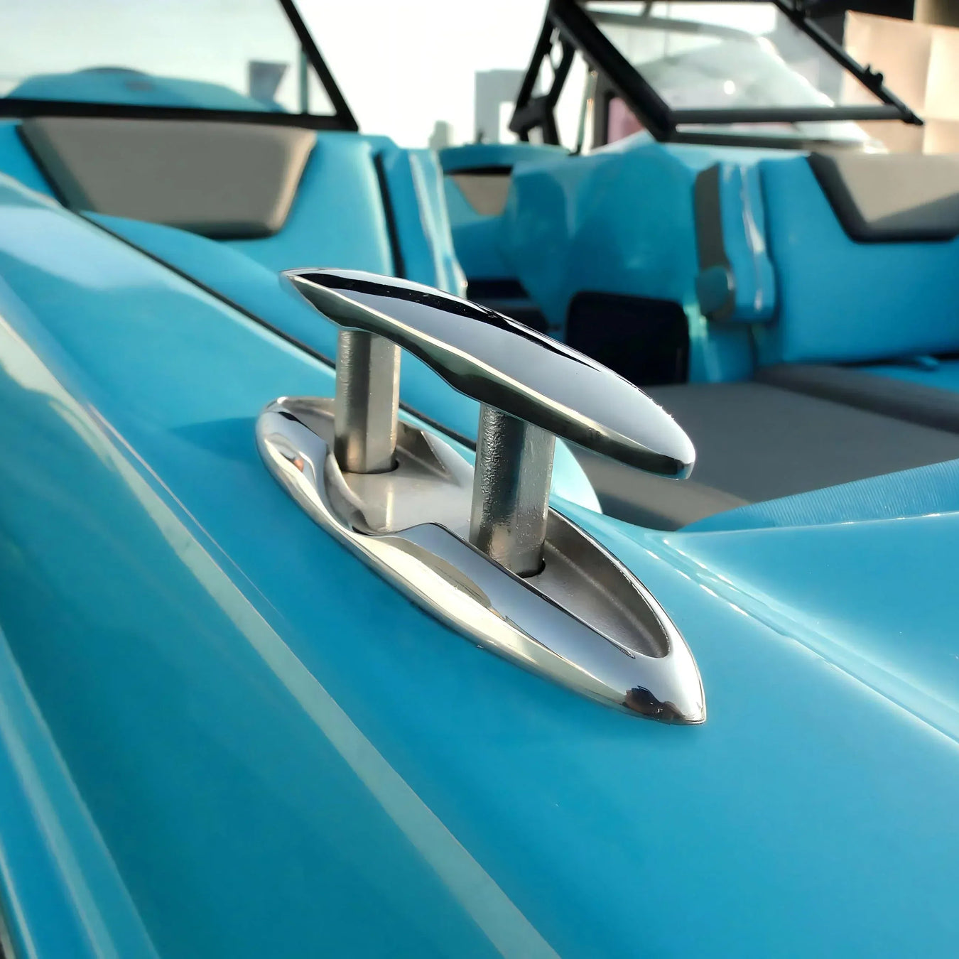 Close-up of a blue boat interior with a heavy duty boat cleat